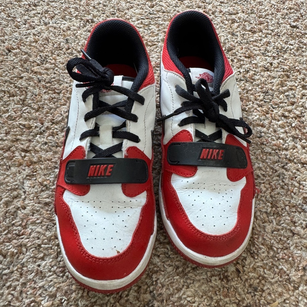 Kids Nike Air Jordan’s red, black, white, low top, tie closure, size 2.5Y